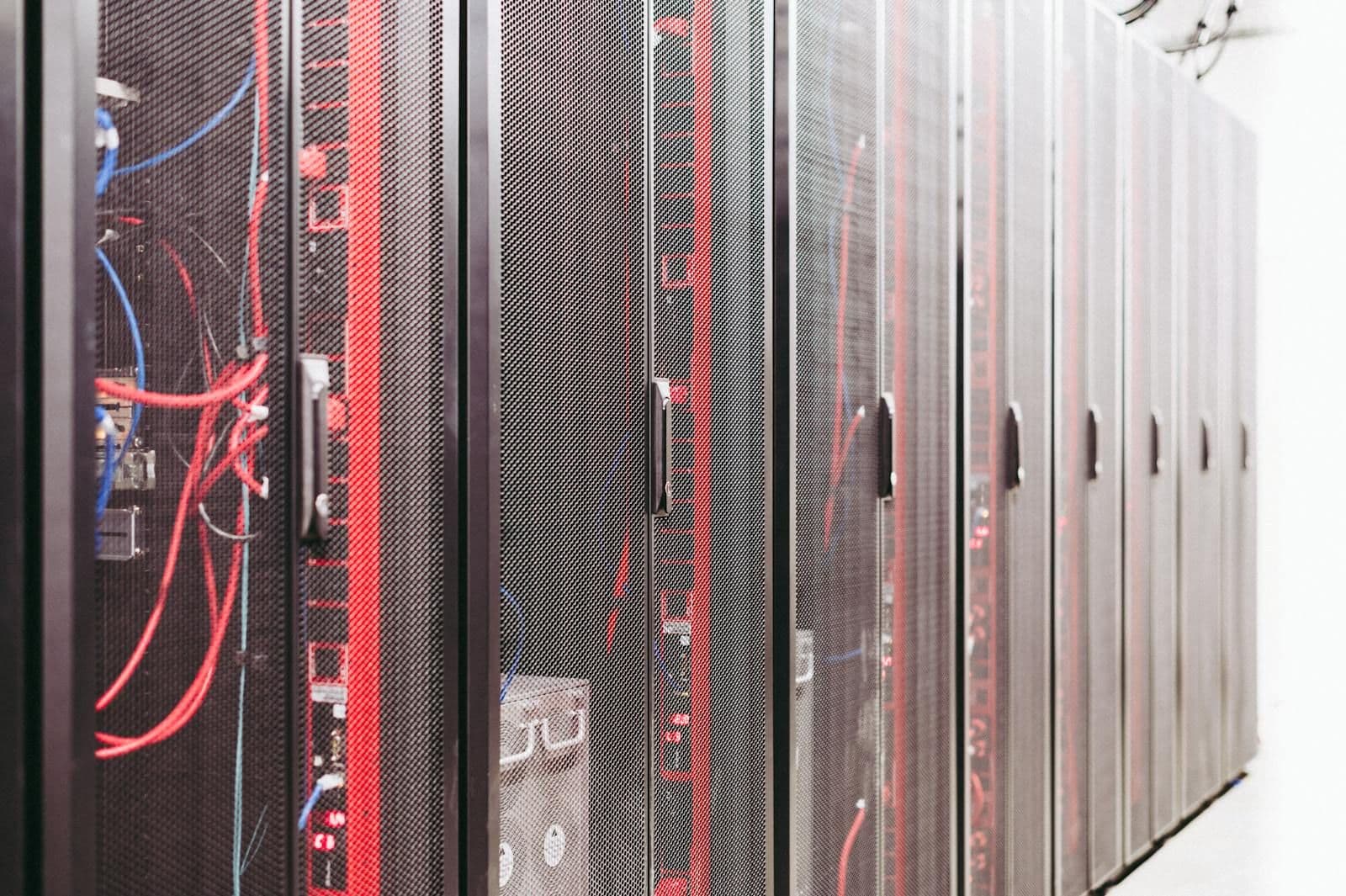 Modern data center with illuminated server racks in rows